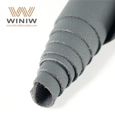 China Líder 1.2mm Microfiber PU Leather Fabric Automotive Interior Material Proveedor