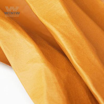 Materiales de PU de microfibra de elasticidad suave para un mejor agarre