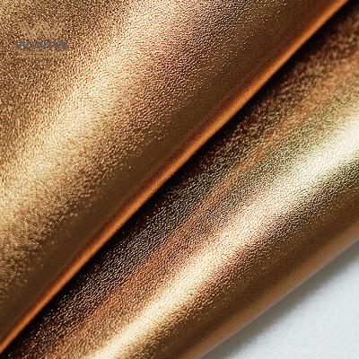 Piel sintética con tacto de cuero para guantes de piel sintética.